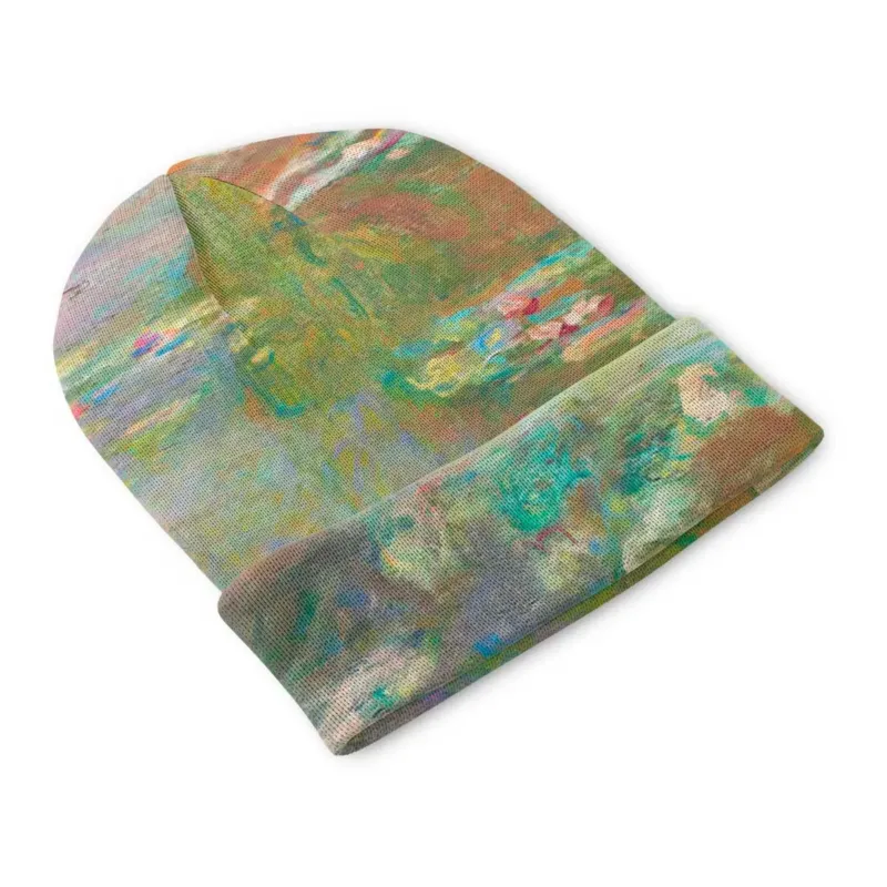 The front shows soft pink lilies floating through green-gold reflections, while turquoise, violet and rust-colored strokes animate the folded cuff.